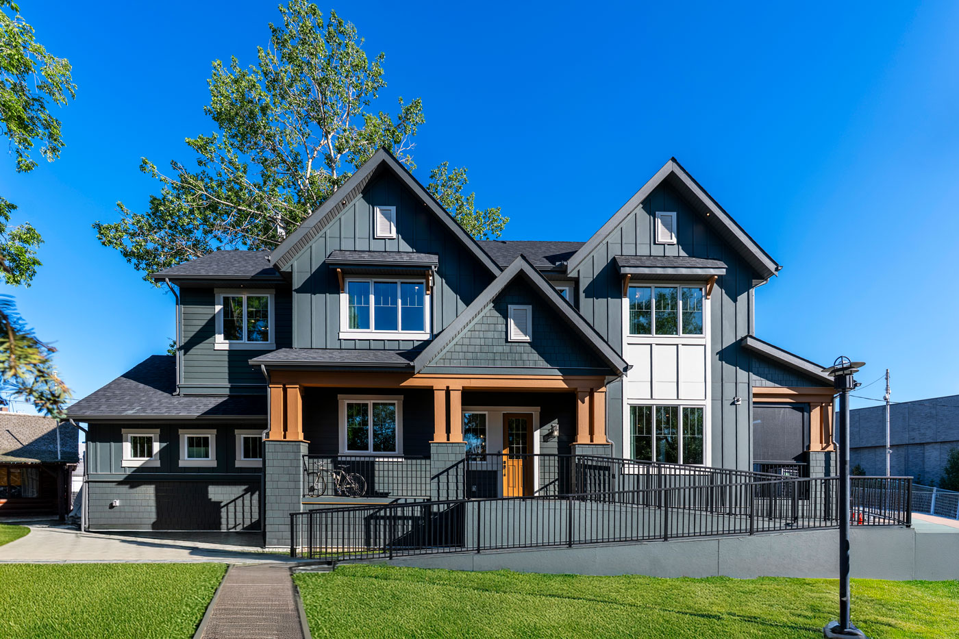 The grey and brown exterior of the 2025 Stampede Lotteries Rotary Dream Home.
