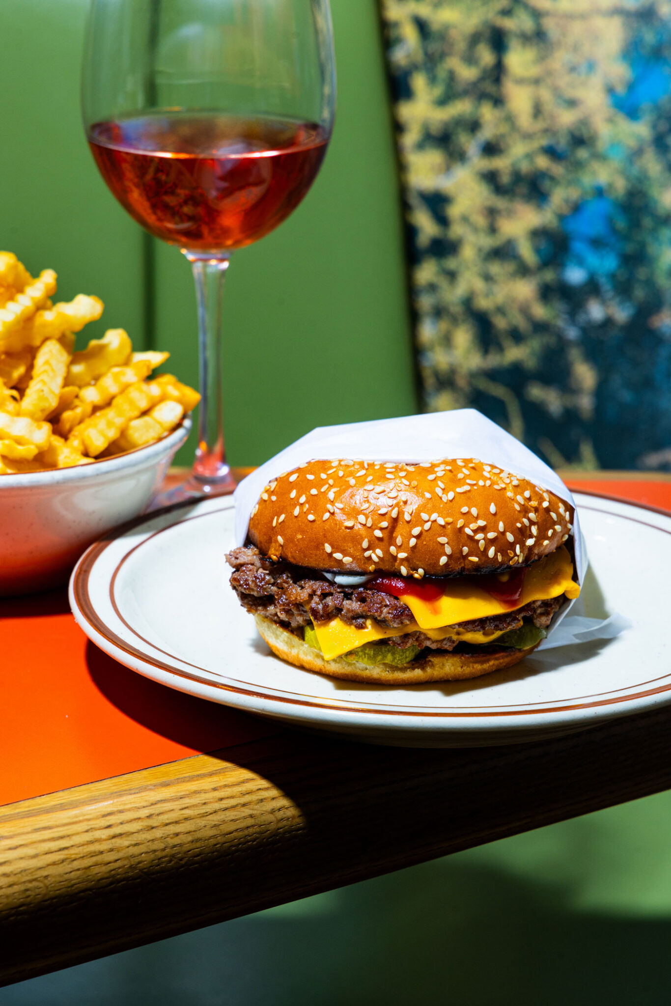 The Donald McRonald burger with fries and a glass of “weird” wine.