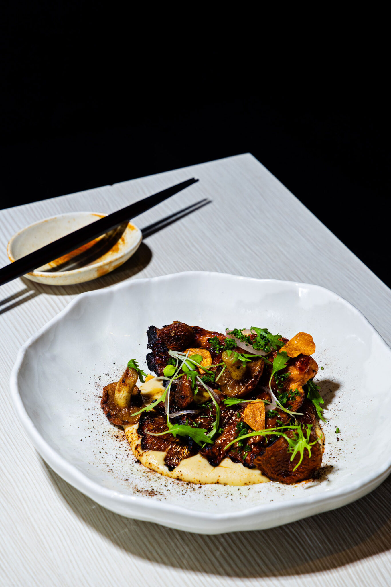 Barbecued pink oyster mushrooms with a miso and white bean hummus. 