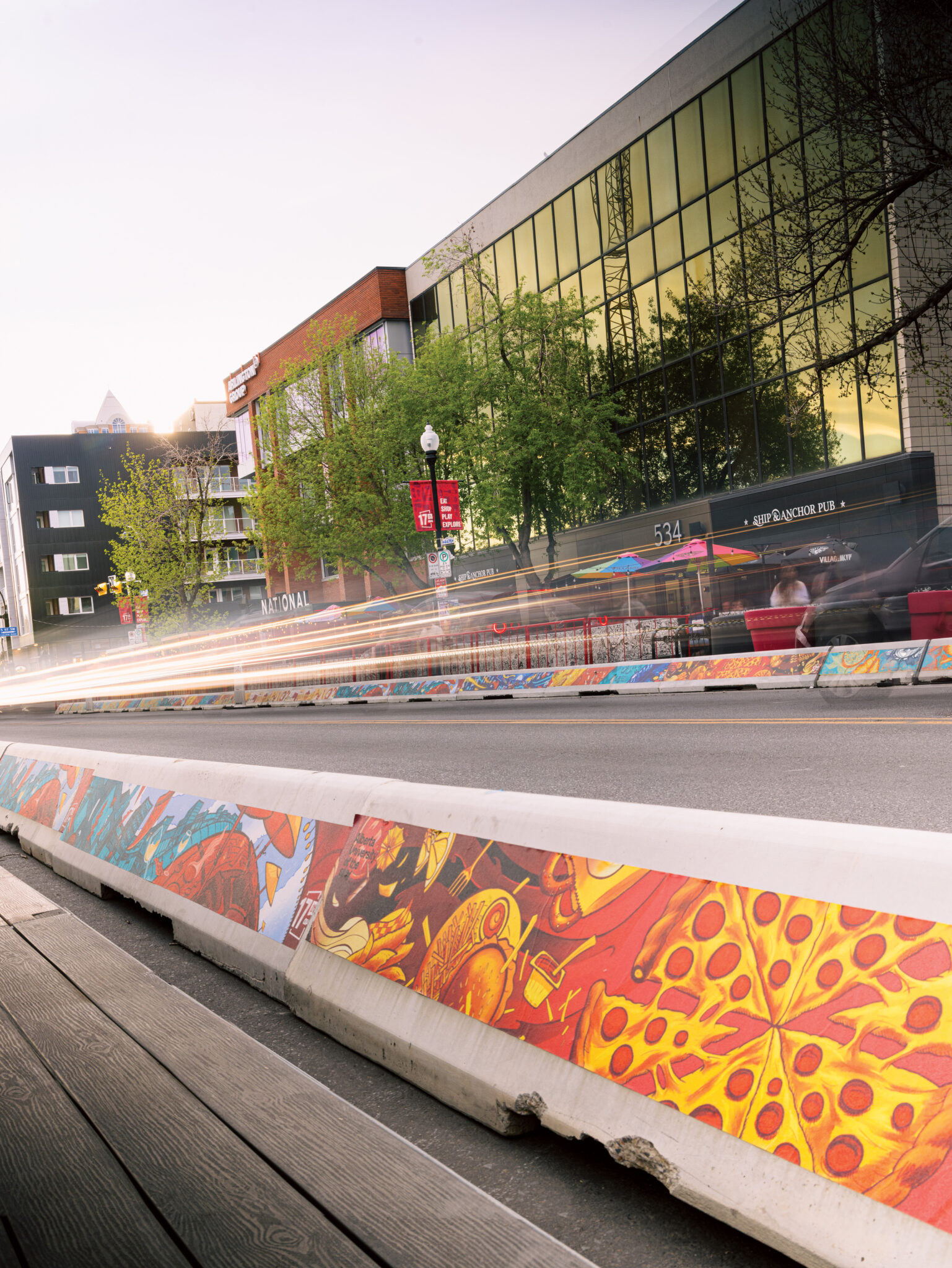 A car speeds by on a street in the Beltline.