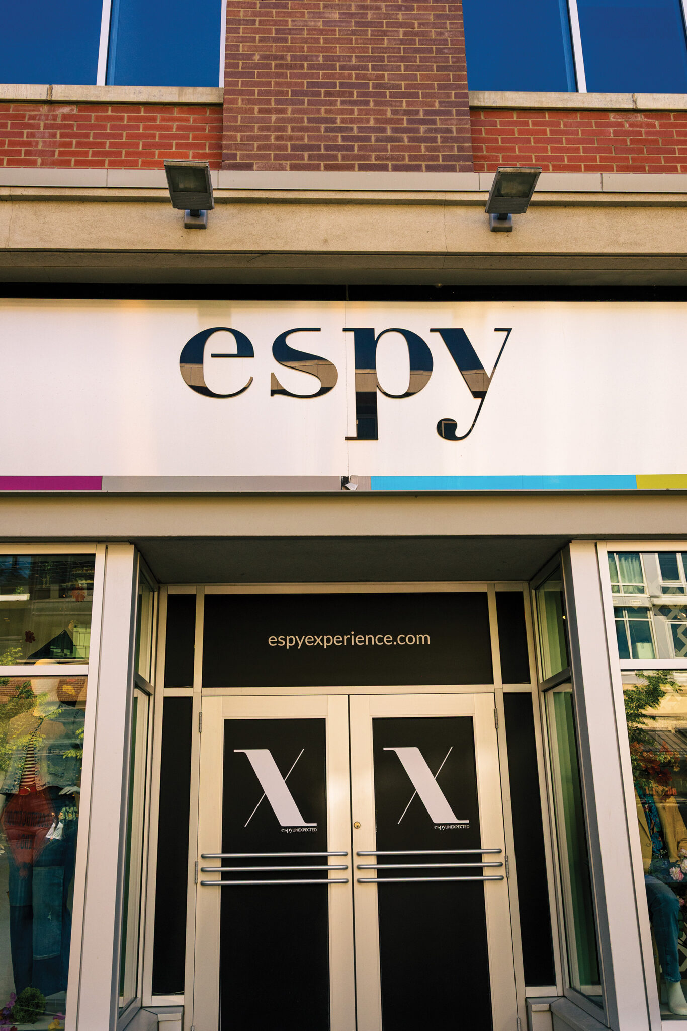 The outdoor storefront of a clothing store.