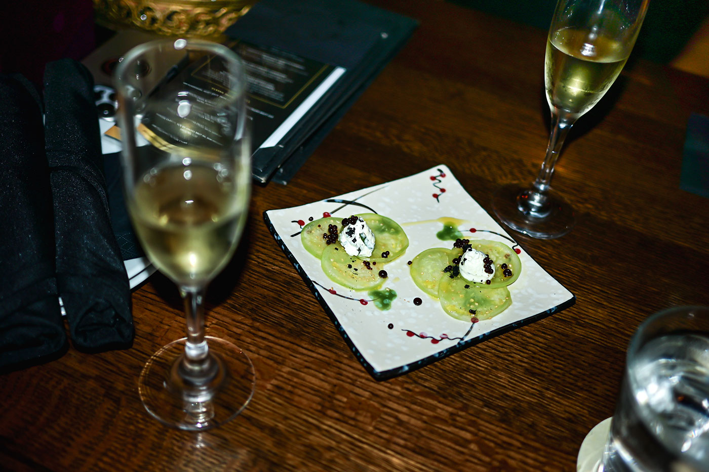 Tomatillo carpaccio and sparkling wine pairing from Untitled Champagne Lounge.
