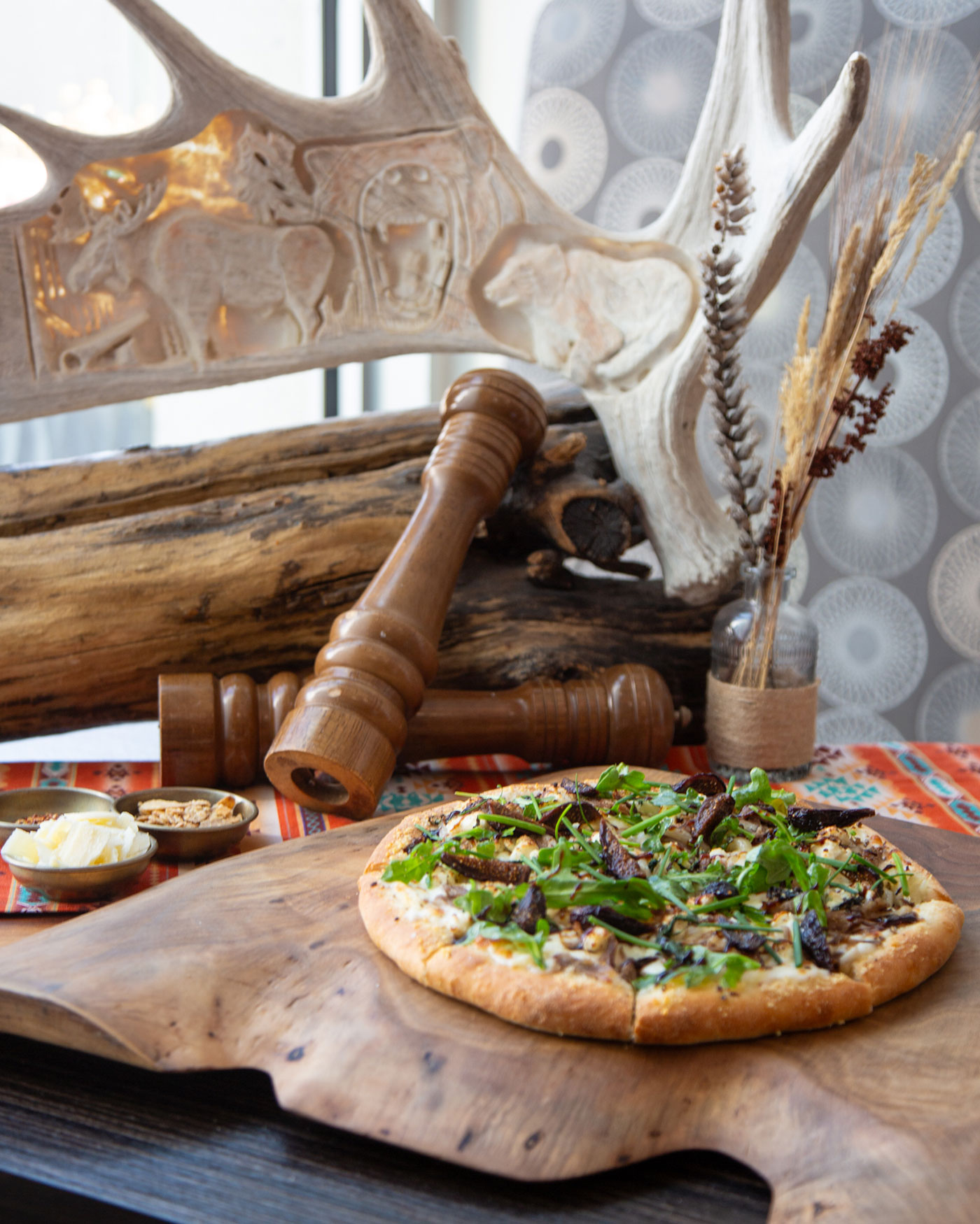 A pizza sitting on a wooden board
