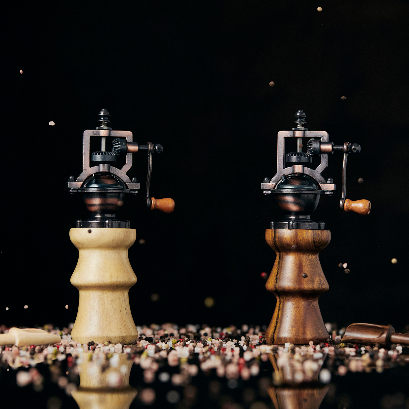 Two salt and pepper grinders