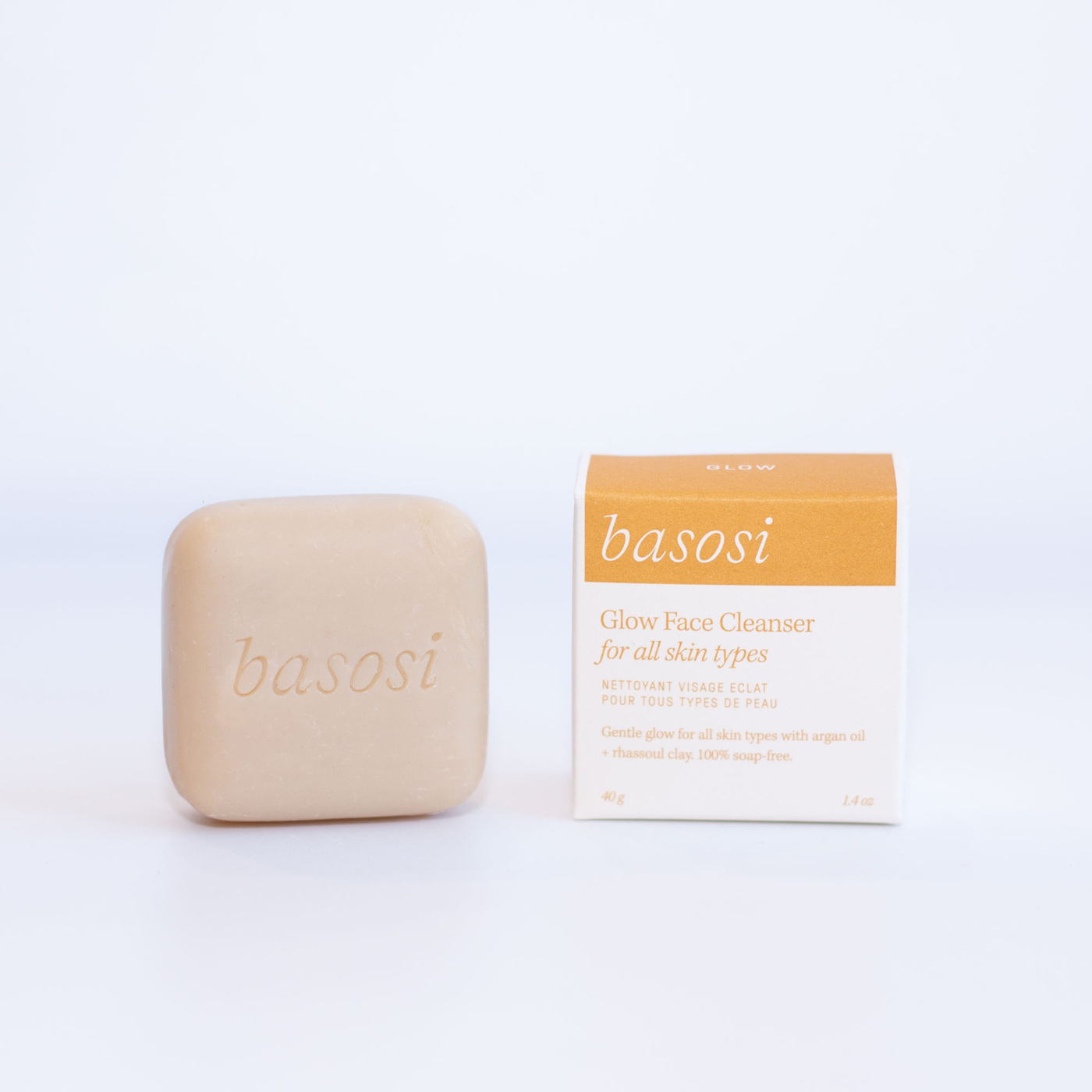 A face cleanser bar beside a box