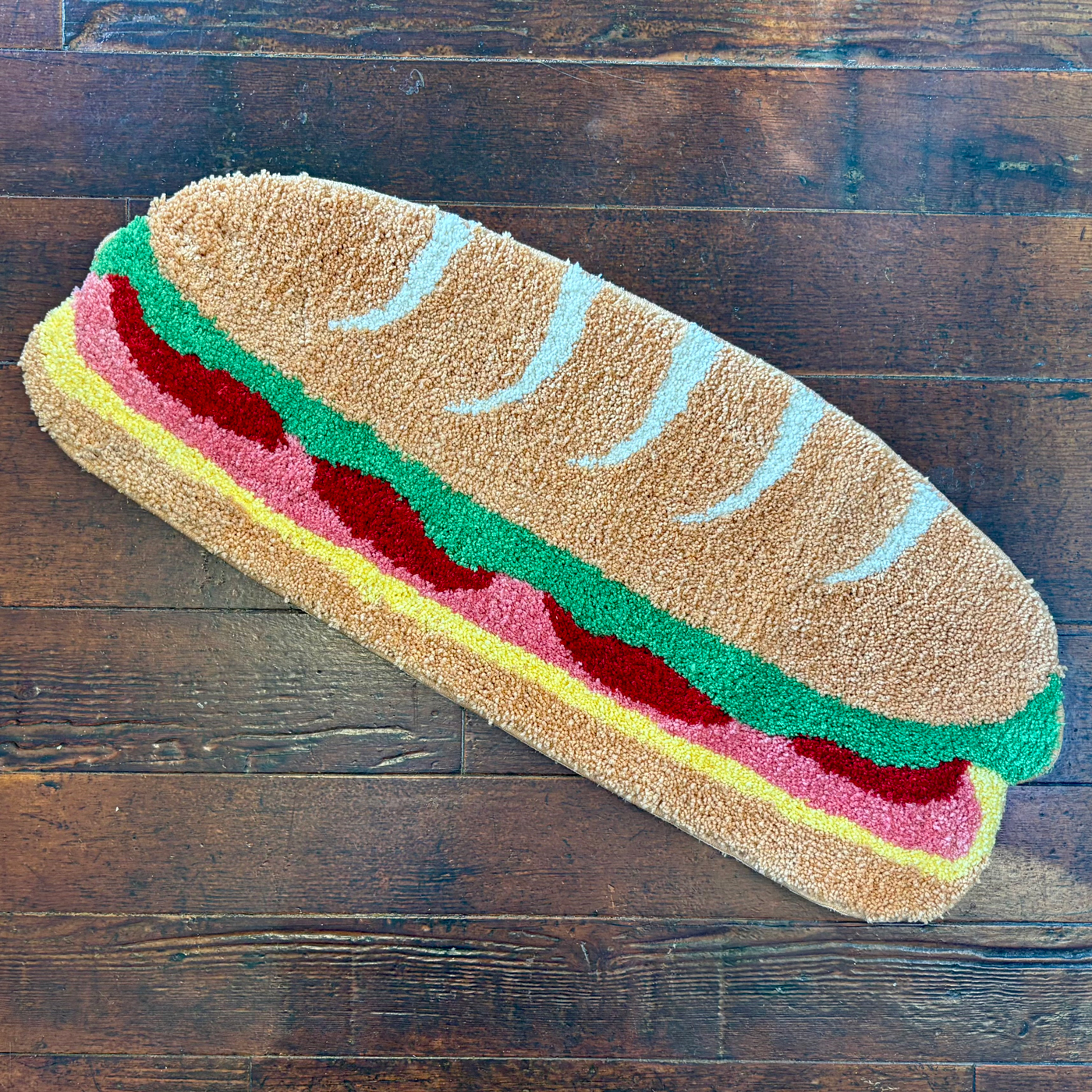 A rug shaped like a sandwich