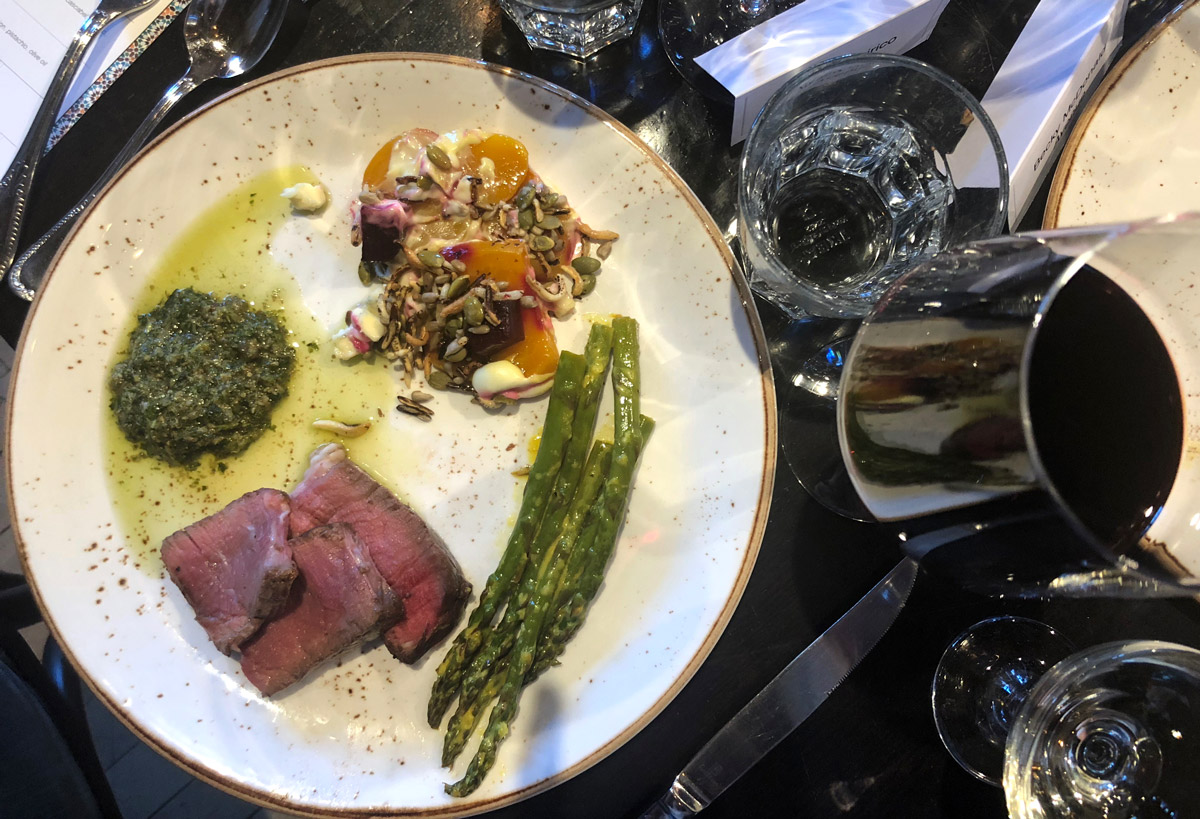 The main course dishes were served family style and included dry aged porterhouse with chimichurri, charcoal roasted beets with blue cheese, and asparagus.