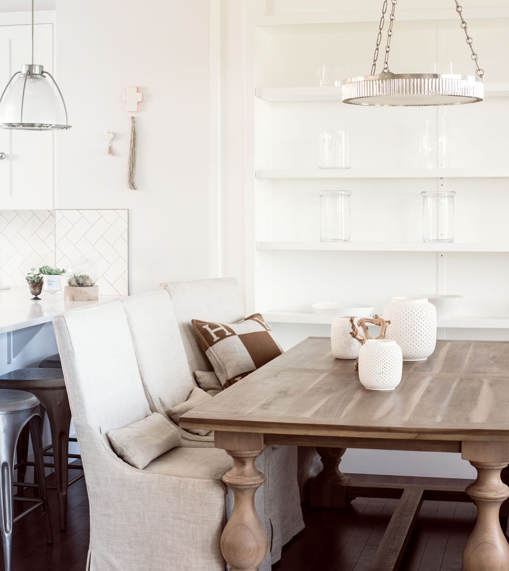 Homeowner Sarah Swanson keeps things simple and seaside-inspired in her dining area.