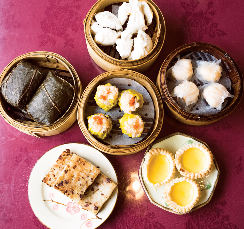 Clockwise from top left: sticky rice in lotus leaf, steamed barbecued pork buns, shrimp dumpling, baked egg tarts, pan-fried turnip cakes and steamed shrimp and pork dumpling at U & Me.