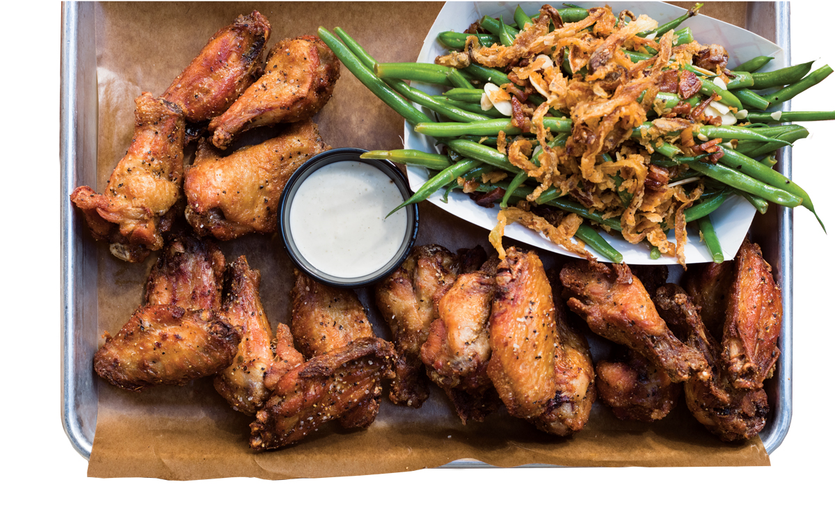 Hayden Block’s smoked chicken wings with a side of green beans.