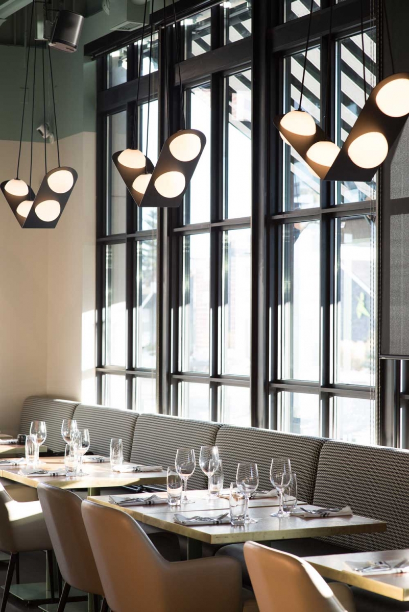 The sunny main-floor dining room at Elbow Room.