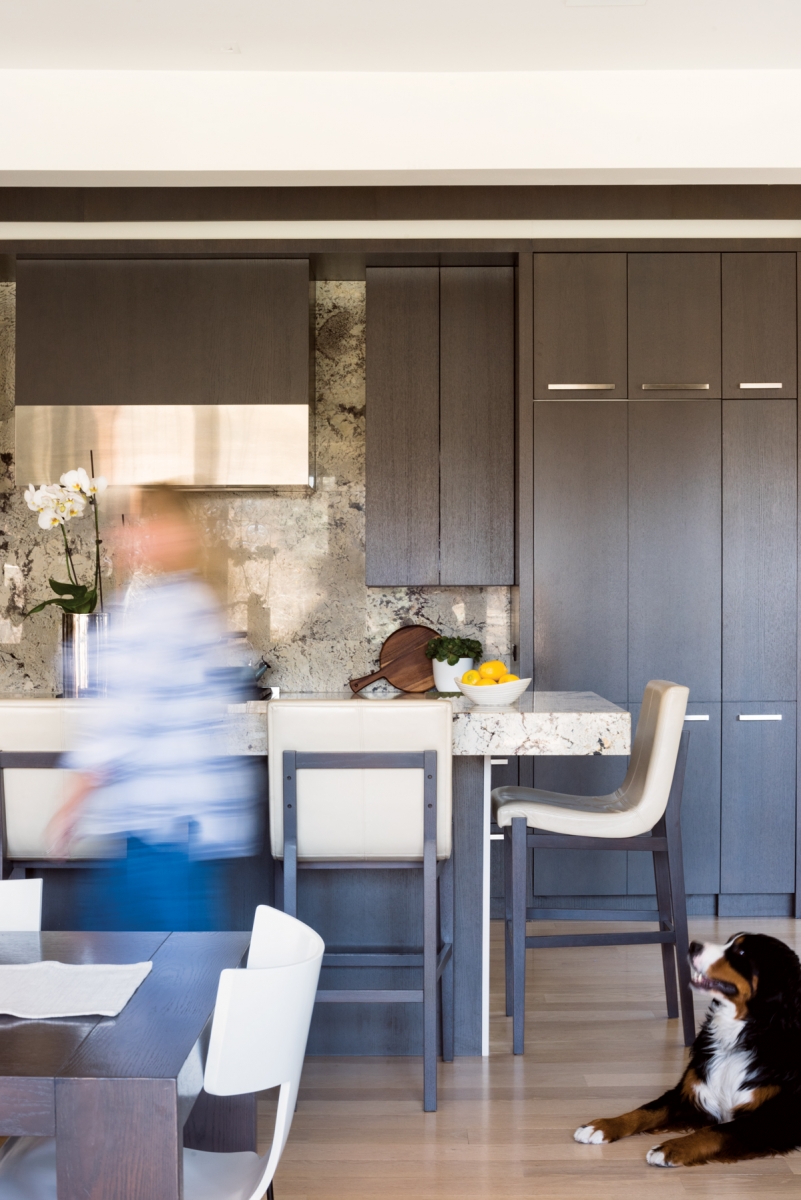 The home is an excellent space for entertaining, as well as cooking and baking, which the Armstrongs love to do. The lighter granite countertop and backsplash balance out the darker cabinetry.Â