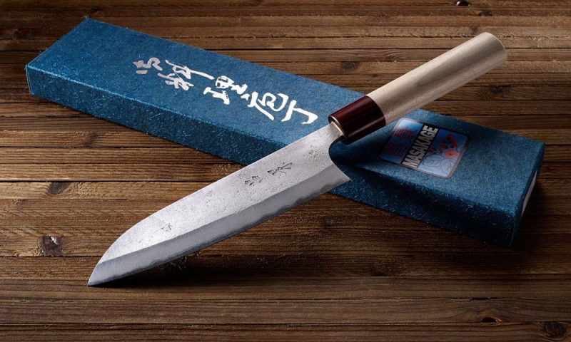 Japanese knife-maker Masakage includes a five-yen coin in all its boxes to address superstitions.