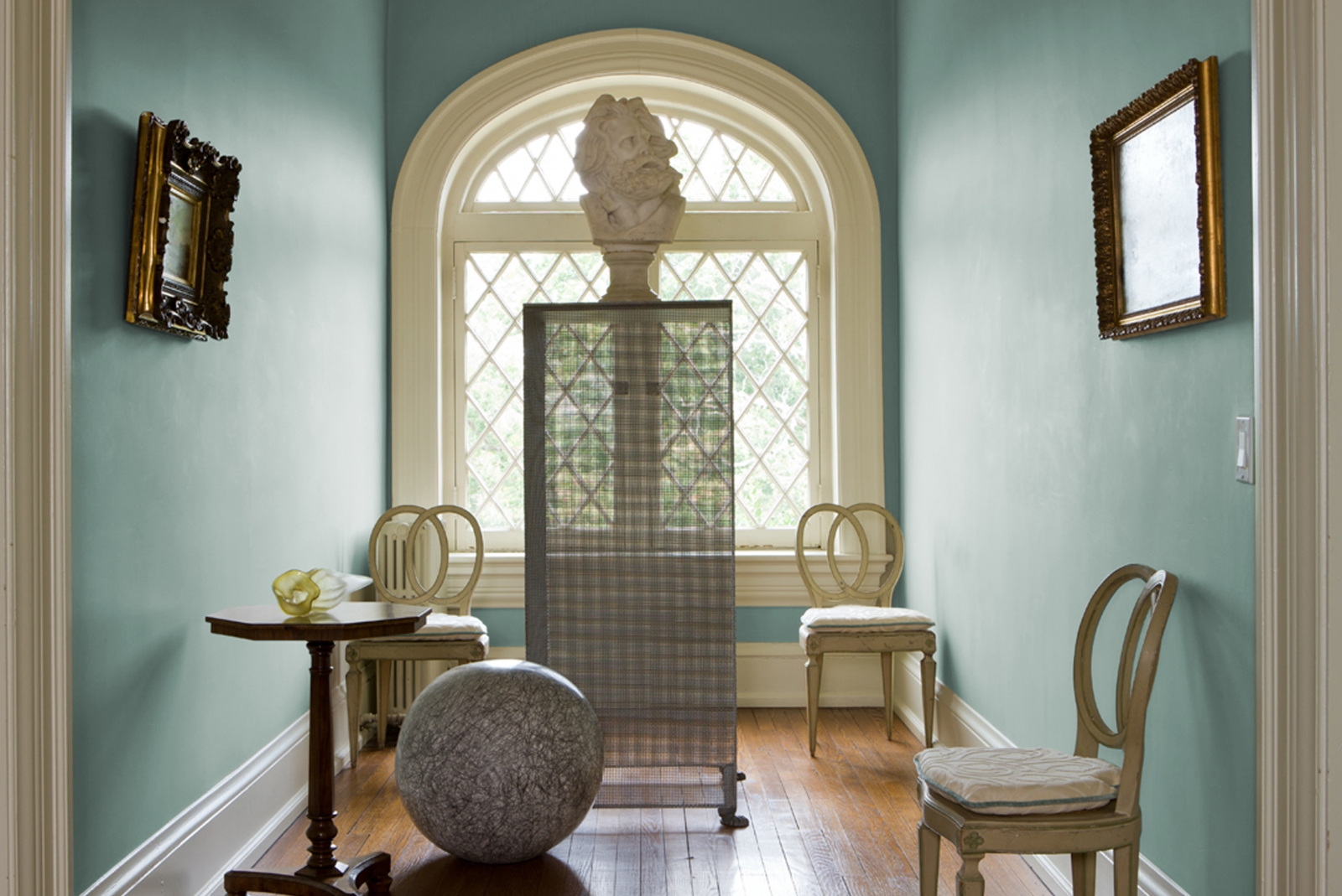 Dixon uses C2 Paint's Misty Morn as a clean and cool backdrop in this traditional room.