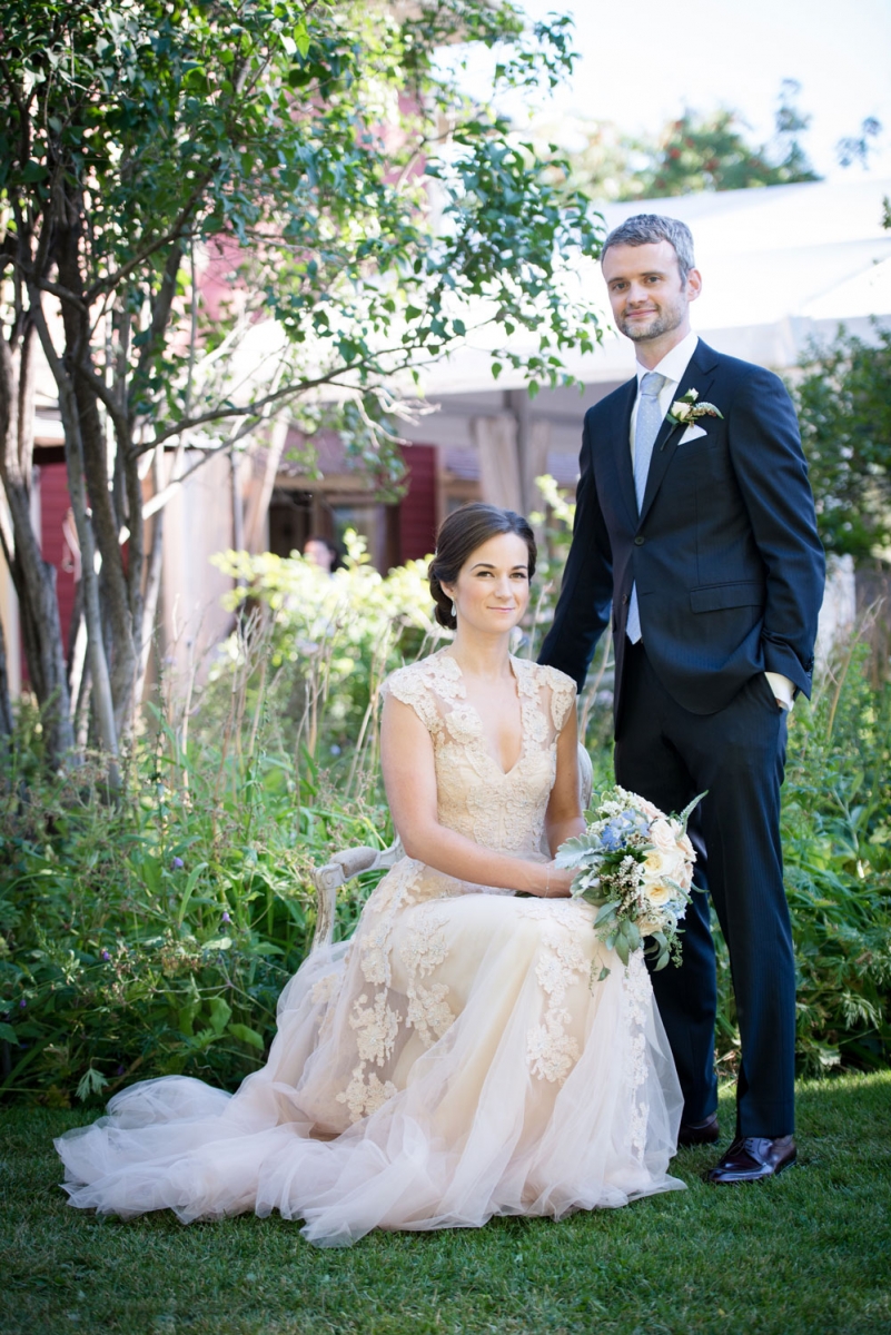 The bride and groom pose for a photo in Rouge’s beautiful garden, which borders the Inglewood restaurant.