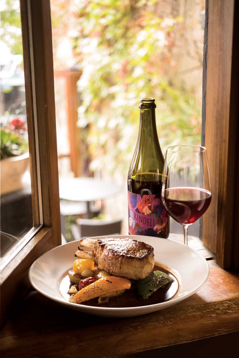 Berkshire pork chop paired with Kendeli pinot noir-syrah at Cilantro.