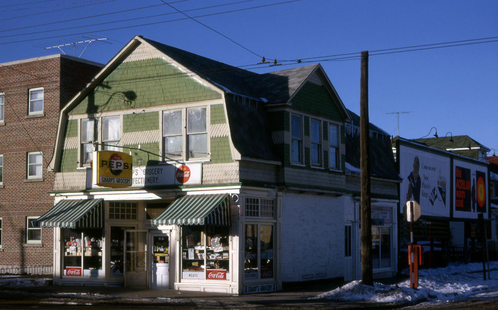 The Jalland Block housed Sharp's Grocery when this photograph was taken on November 17, 1965.