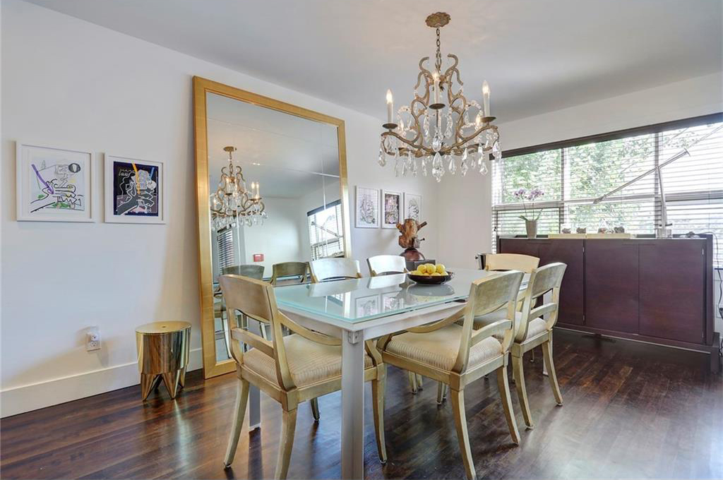 It has refinished hardwood floors throughout including in the dining room.